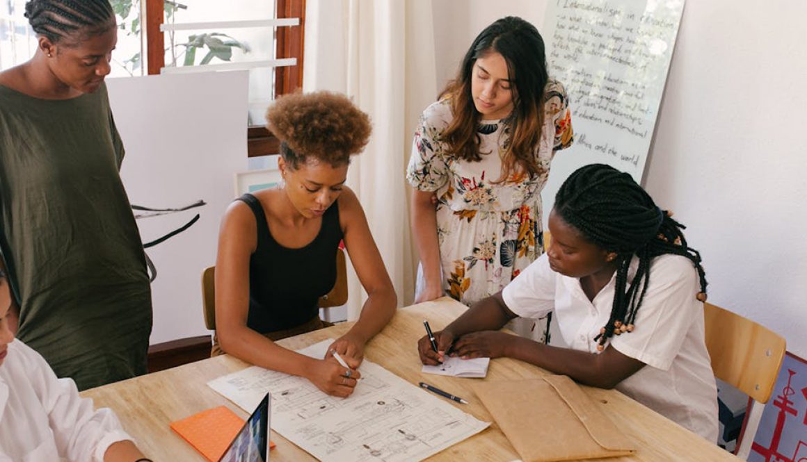 How accurate is AI translation? Group of workers checking a document.