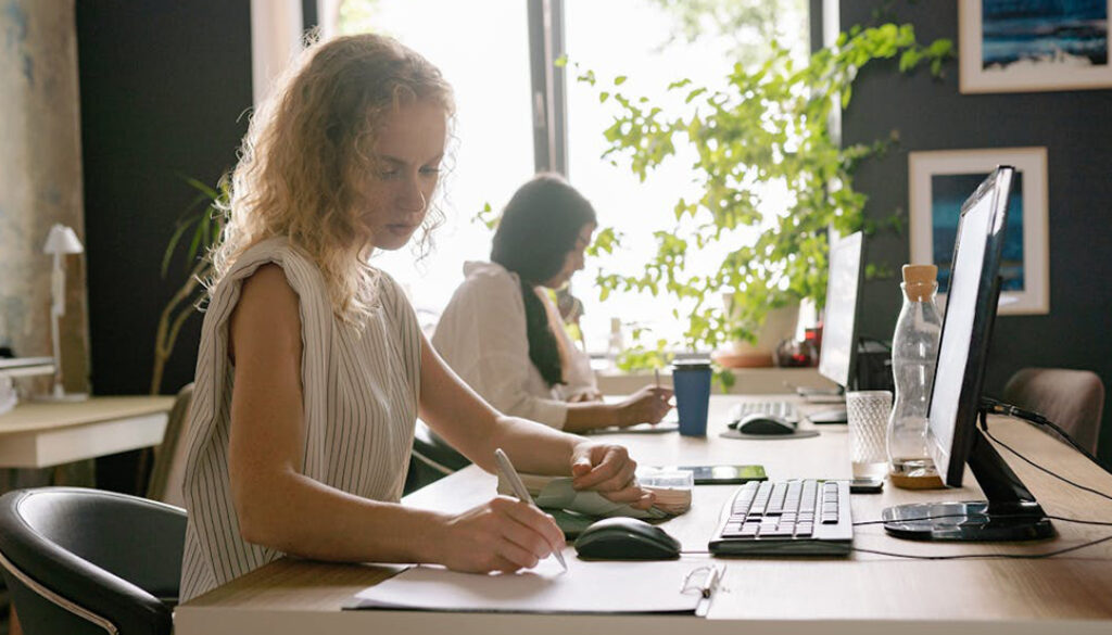 Machine Translation Post-Editing: Editor working at her desk