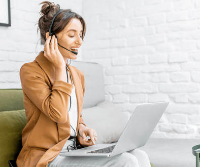 Business woman talking on the phone — learn a new language online and boost your career!