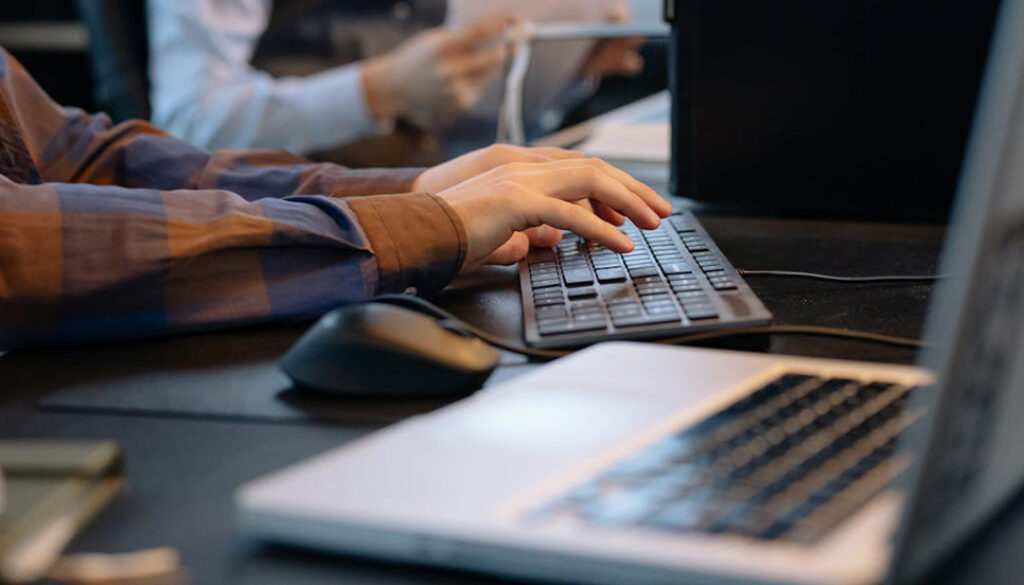 Office worker writing an email