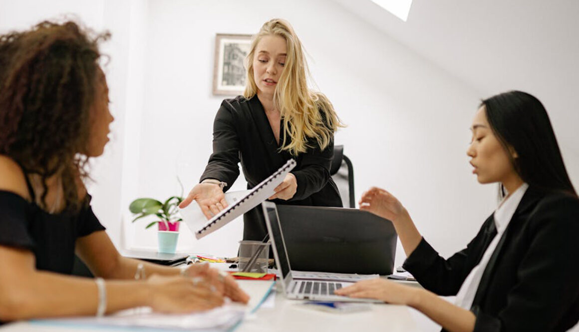 Office workers in a meeting, hopefully using plain English or Business English